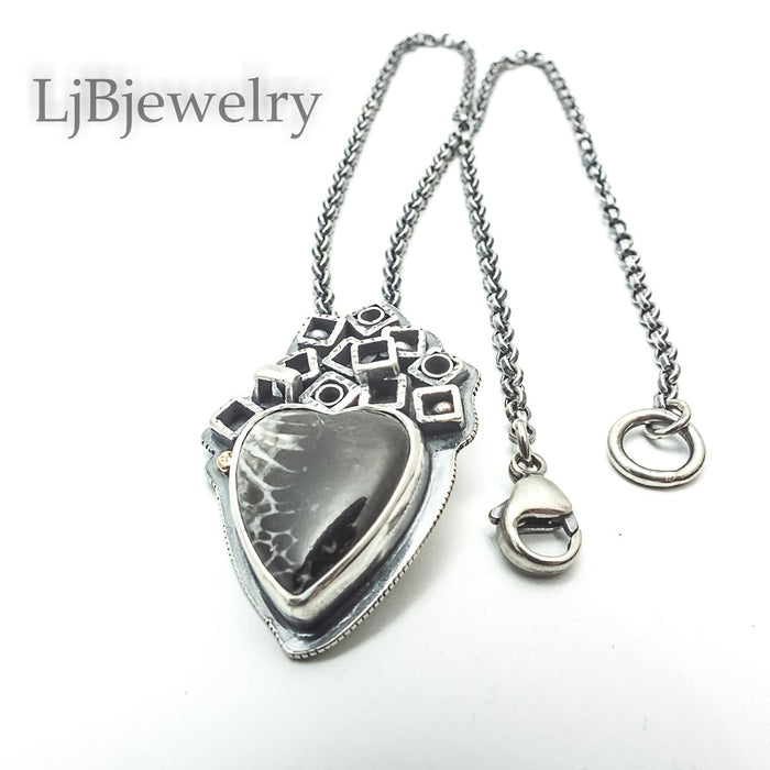 coral heart fossil sterling silver pendant
