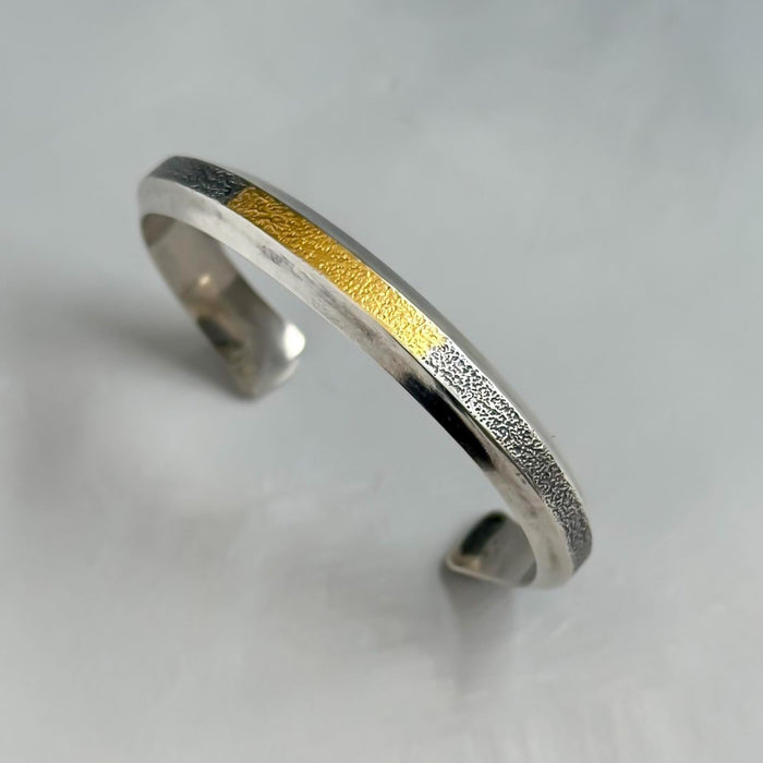 Silver and gold cuff bracelet