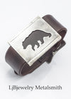 silver bear cuff with leather bracelet