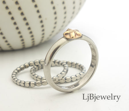 silver and gold star stacking ring set