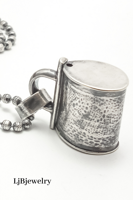 silver purse pendant
