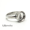 sterling silver ring with a tree design