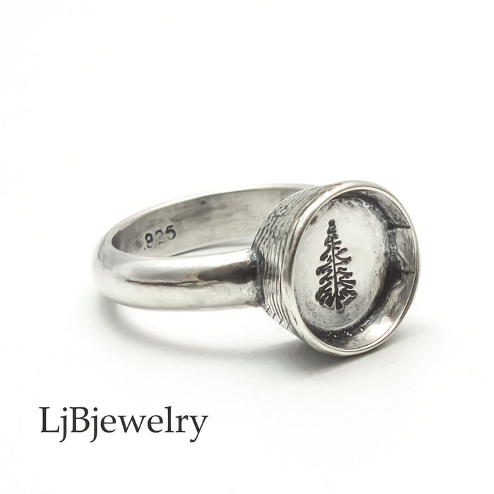 sterling silver ring with a tree design