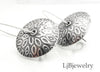 silver textured dangle earrings