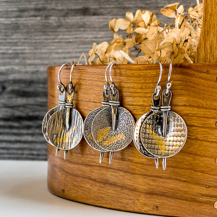 silver and gold dangle earrings