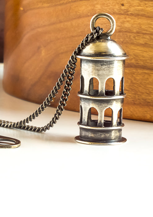 sterling silver necklace with a tower pendant